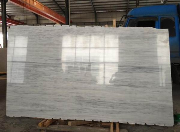 Marble slabs are produced by cutting large blocks into 16mm or 30mm thickness and then polished. Our ordinary size is 2.4m*1.4m some materials can reach 3.1m*1.8m